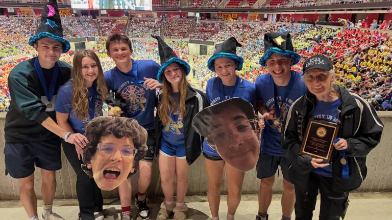Left to right: Grant Nielsen, Clare Barcia, Patrick Fleming, Angelica Barcia, Brooke Nielsen, Connor Giblin, and Coach Terry Balton, with Beau Tannenbaum pictured in cutouts.