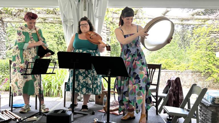 From left to right: Sian Ricketts, Allison Monroe, and Tracy Cowatt perform music from the 13th and 14th centuries.