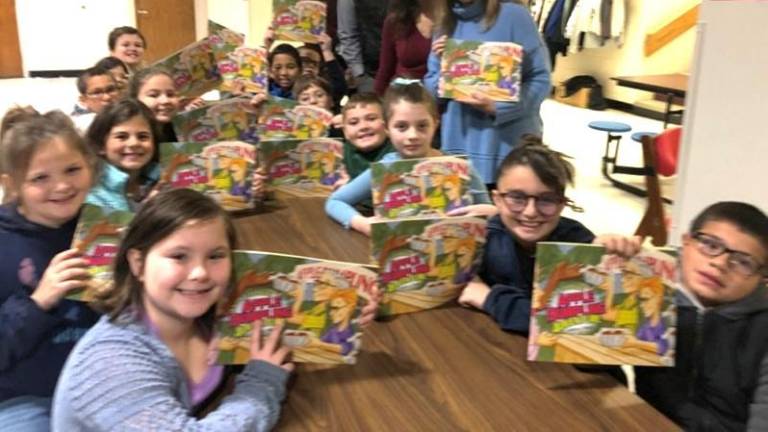 Dingmans Delaware Elementary Principal Jennifer Moriarty, Assistant Superintend and Rotary member Jason Pope, Dingmans Delaware Elementary teachers Mary Keller and Dawn Cuccio, and the school’s third grade class.