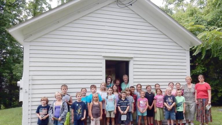 History summer camp is held at the one-room schoolhouse at Price’s Switch, which remains just as it was when it closed in the 1950s. (Photo courtesy of Vernon Historical Society)