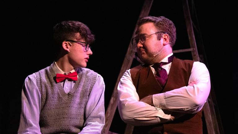 George Gibbs played by Logan Woodward) and Dr. Frank Gibbs (played by Kelly Krieger) have a father/son chat in “Our Town” at the Milford Theater.