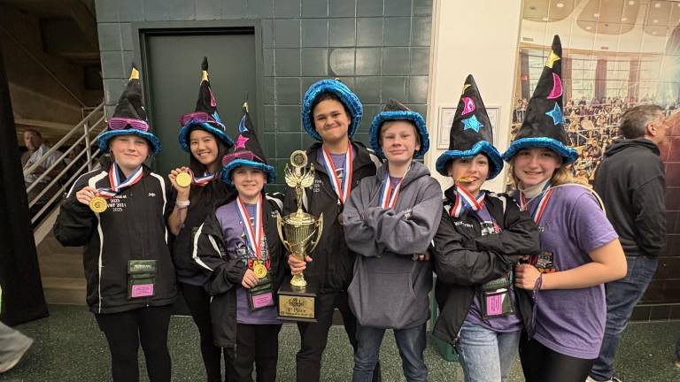The winning DVMS technical team, from left: Joellen Nielsen, Patty Chen, Keston Monahan, Christopher Miller, Michael Simmons, Adelyn Gamer and Ariel Weyant.