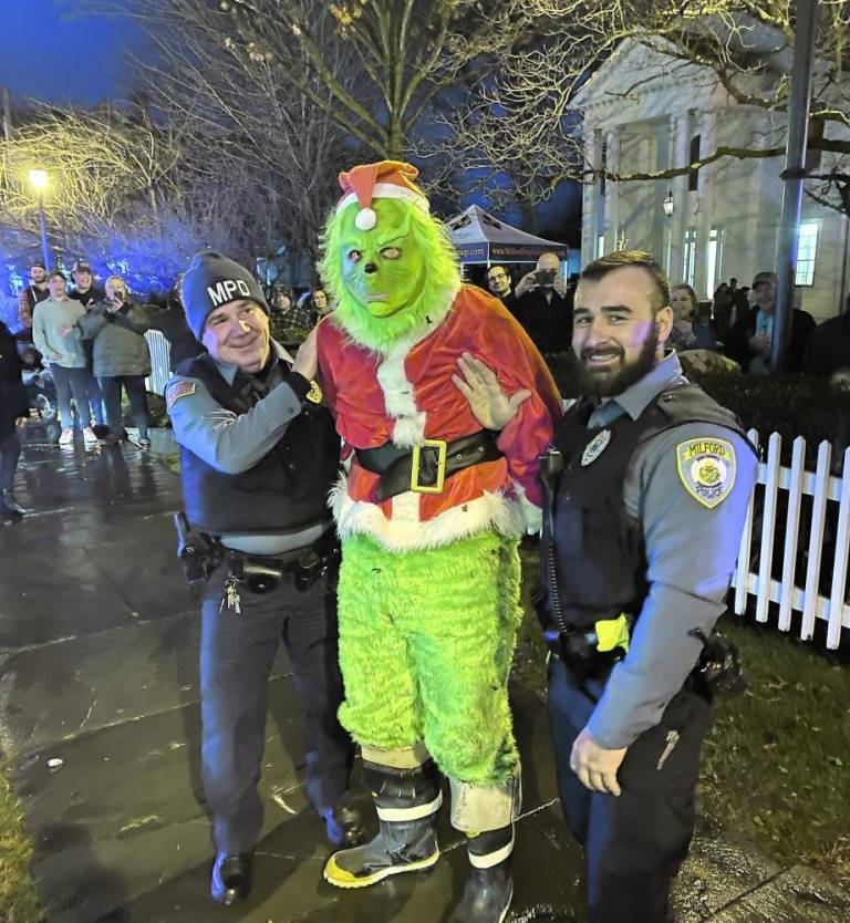 $!Lights, cookies and unity at Milford tree lighting