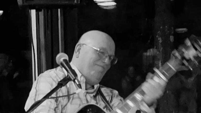 Ernie Sandonato performs a mix of classic rock, pop, and folk favorites at Log Tavern Brewing on June 12.