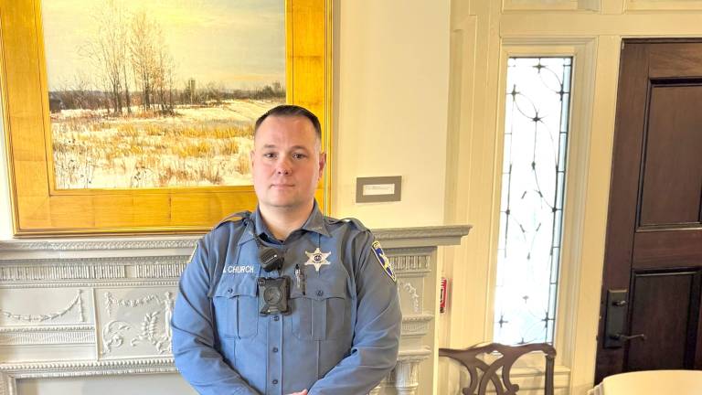 K-9 Medic poses with his handler Deputy Michael Church.