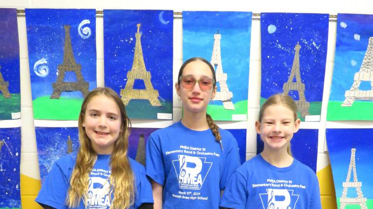L-R: Macy Ellis, Norah Jaludi, Elyse Behnke performed at the PMEA District 10 Elementary Band and Orchestra Fest .