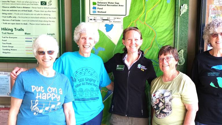 PEEC CEO Amanda Subjin with Girl Scout Camp Hidden Falls Leaders.